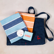 For the Chef gift set by Skunk Goods Trading, with a denim apron, two handwoven tea towels and natural soap