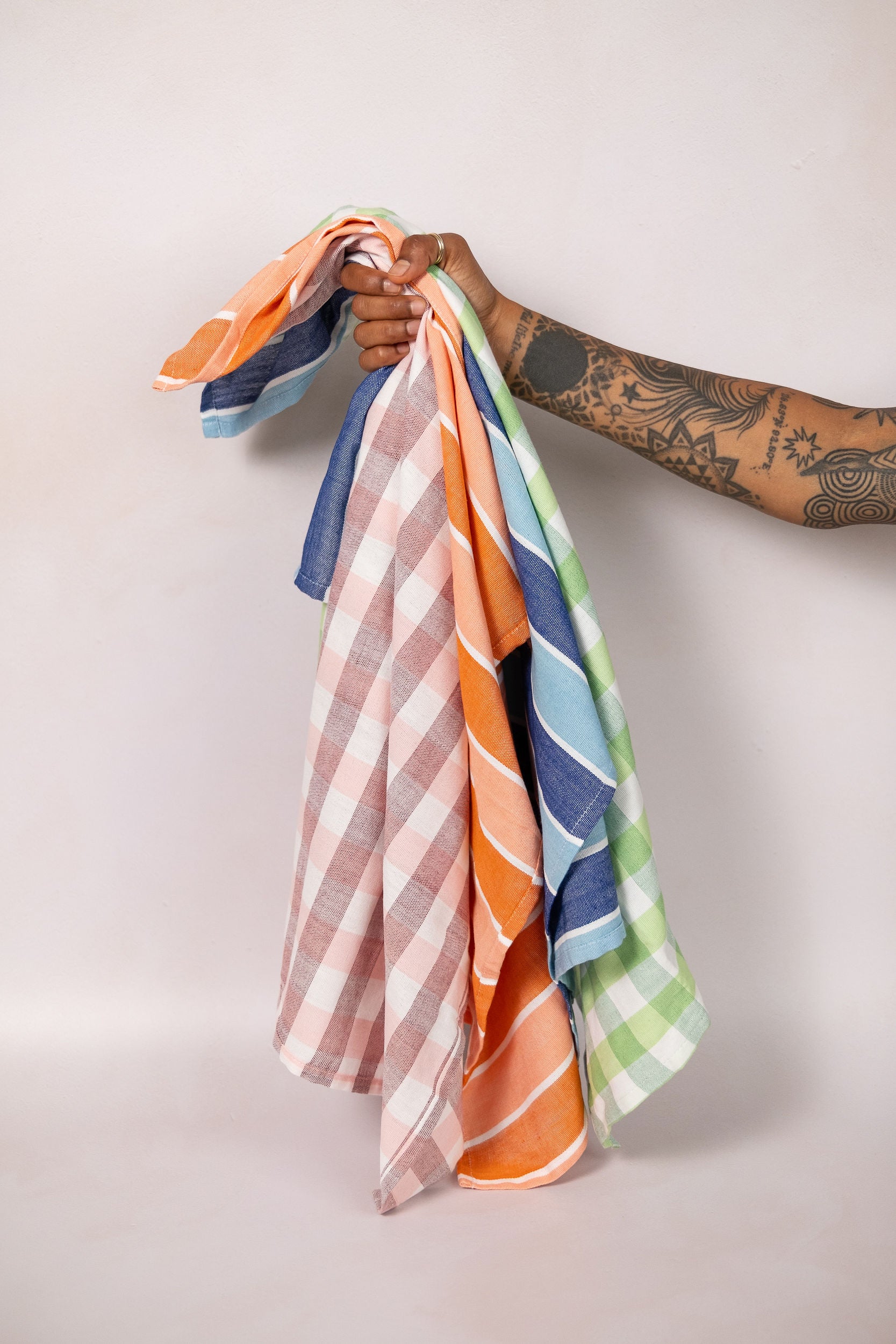 Skunk Goods Trading kitchen essentials, including handwoven cotton tea towels