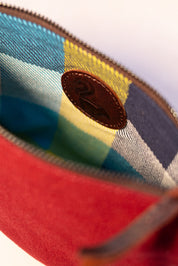 Maroon canvas pouch + soap + handbalm