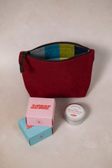 Maroon canvas pouch + soap + handbalm