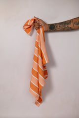 Orange and white stripe tea towel