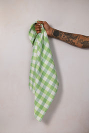 Green and white tea towel