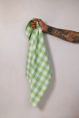 Green and white tea towel