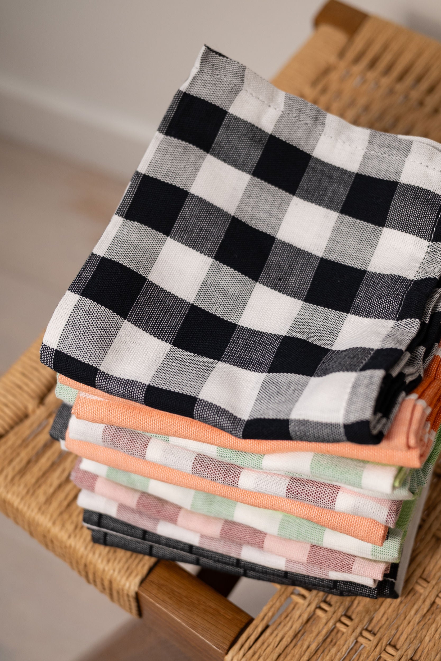 Pink and white check tea towel