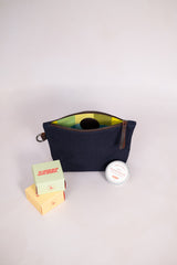 Canvas pouch in navy with soap and balm