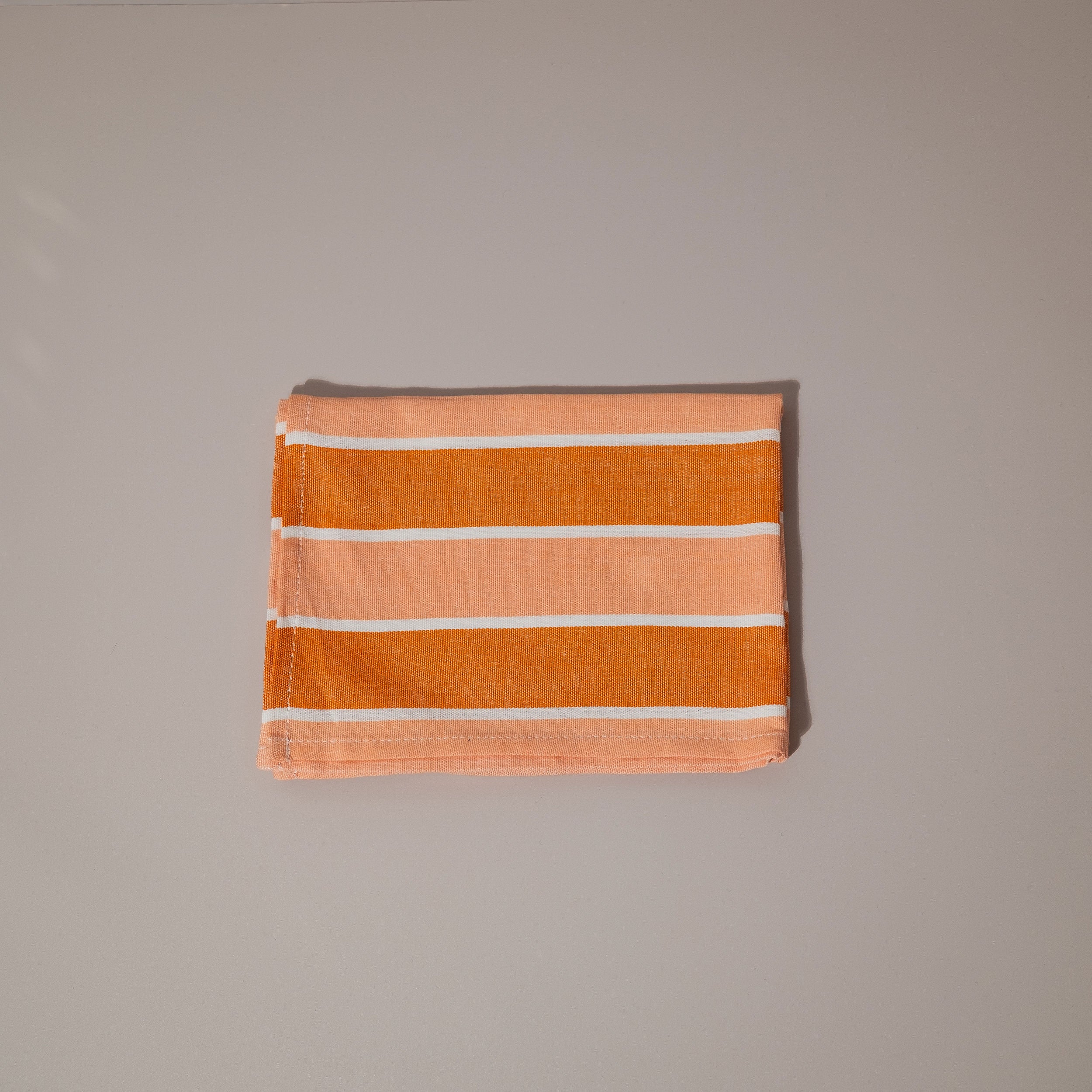Orange and white stripe tea towel
