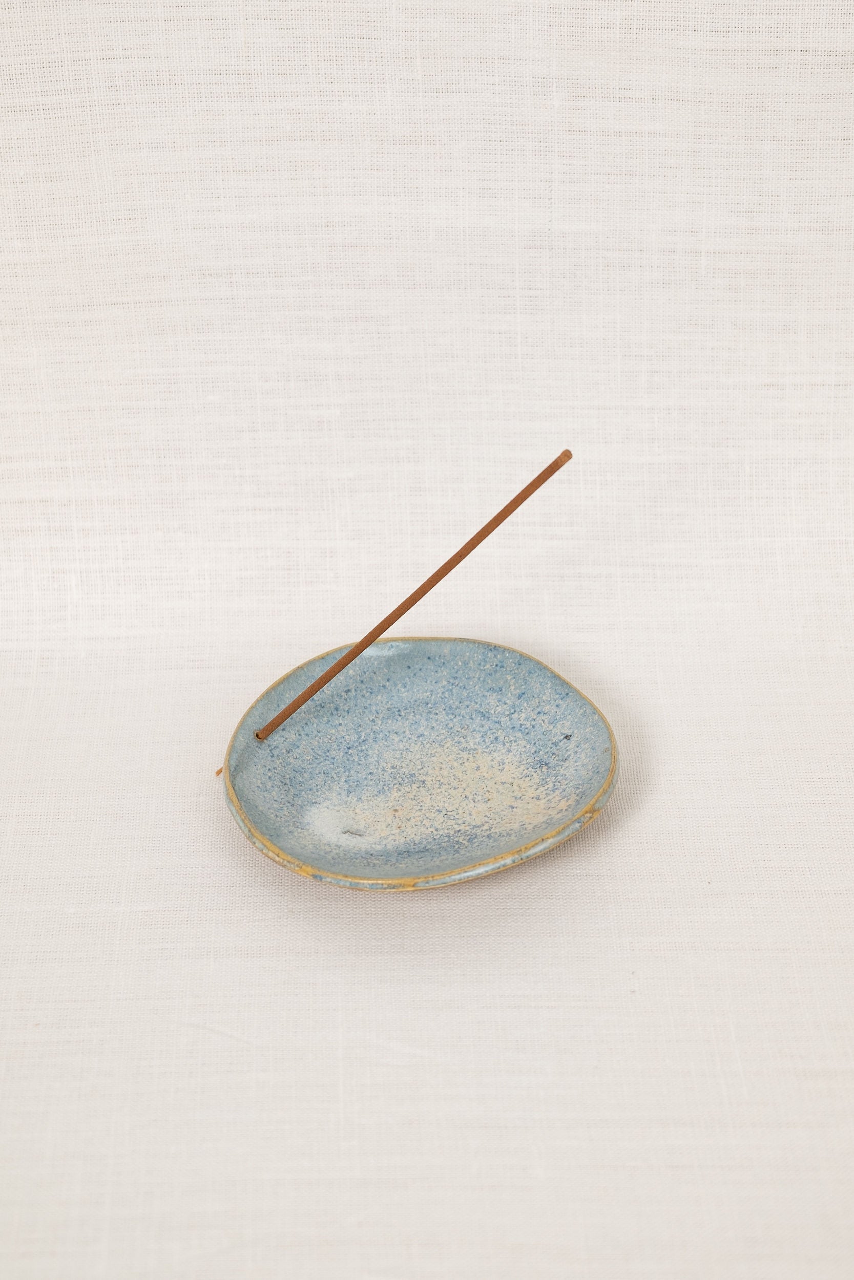 Blue ceramic incense holder